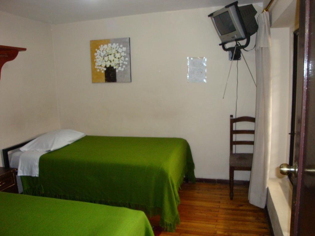 Hostal Santa Maria Gracia Кіто Номер фото