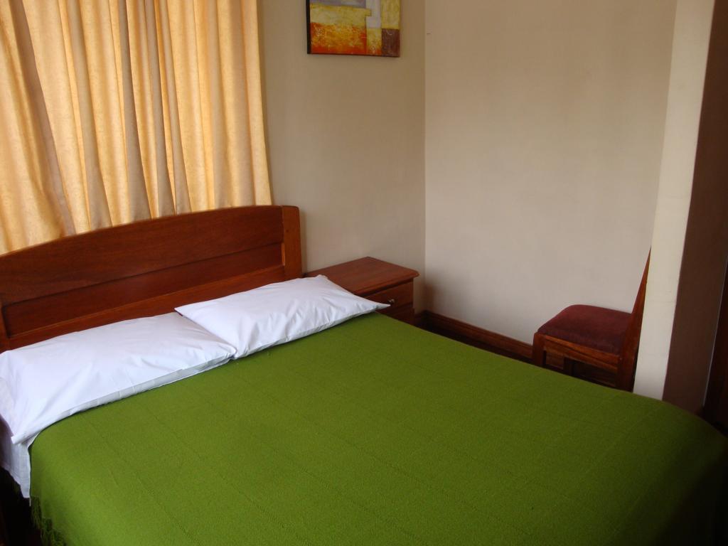 Hostal Santa Maria Gracia Кіто Номер фото