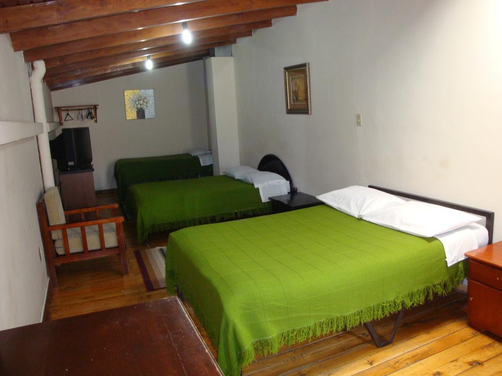 Hostal Santa Maria Gracia Кіто Номер фото