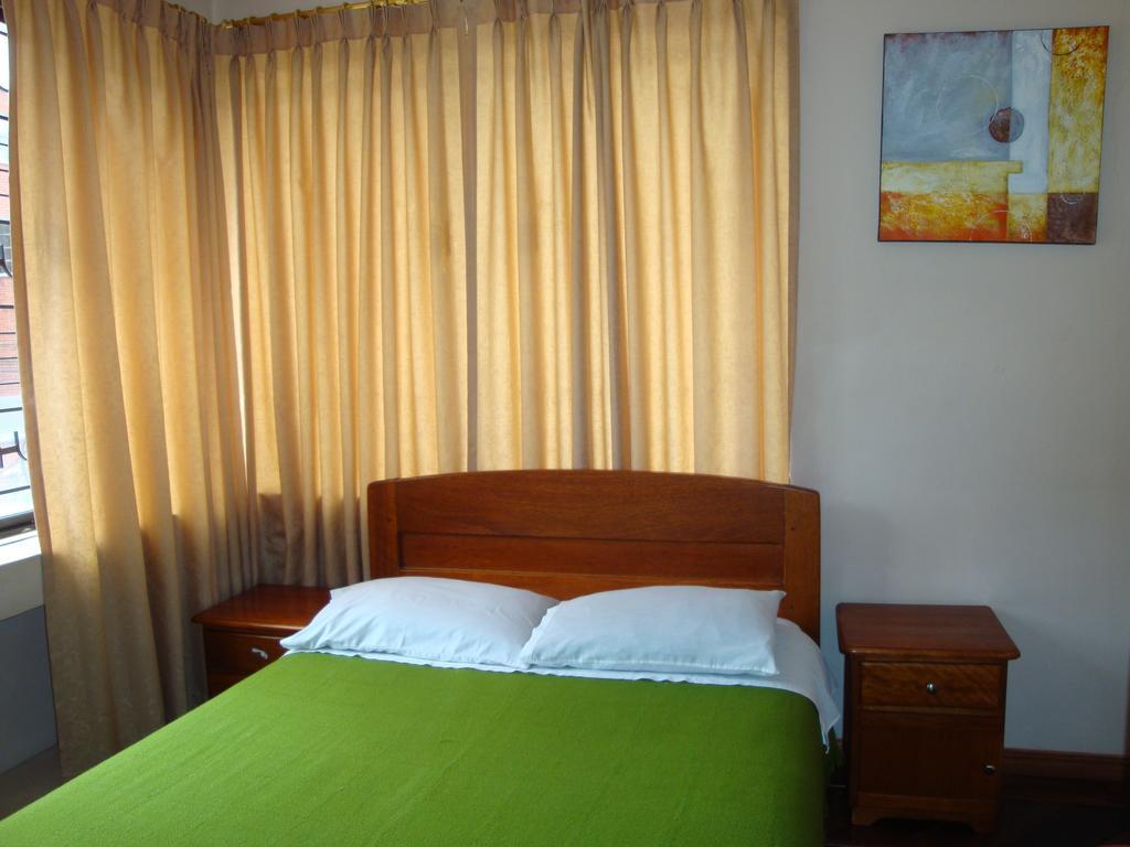 Hostal Santa Maria Gracia Кіто Номер фото